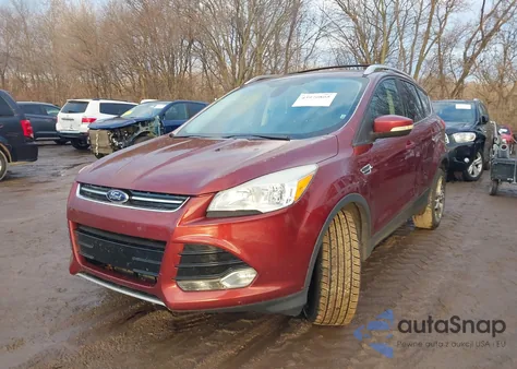 2014 Ford Escape Titanium z USA, uszkodzony, nr VIN 1FMCU9J96EUA01698